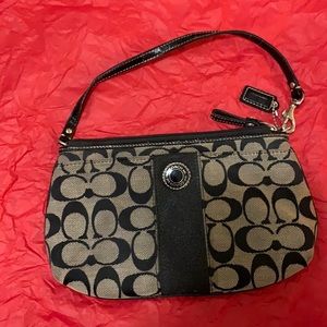 Authentic coach clutch